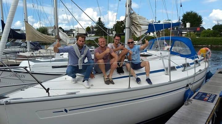 Happy crew on sailboat