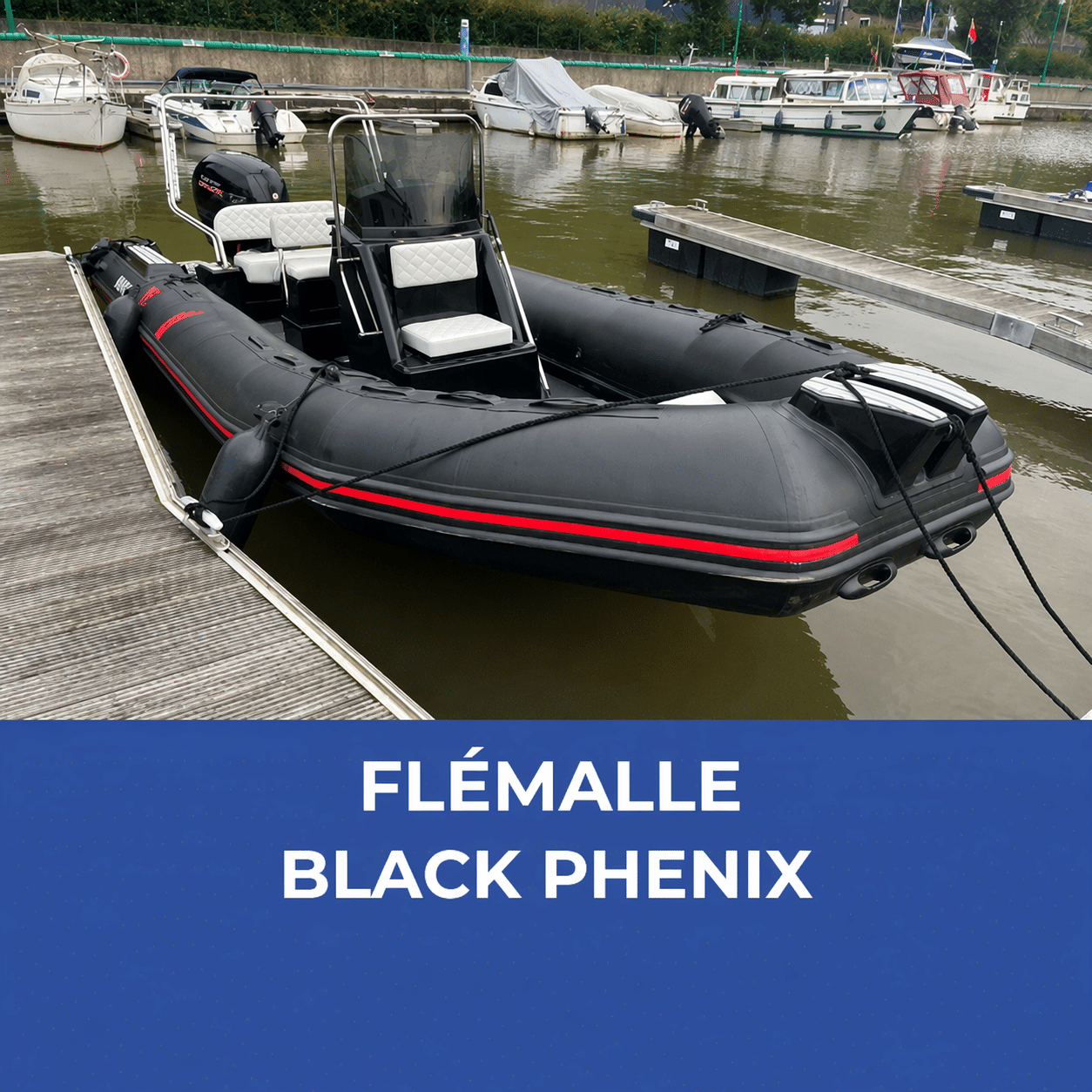 Inflatable black RIB boat docked at a marina with white quilted seats and a black windshield, moored to a wooden pier.